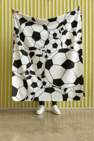 Soccer pattern fleece throw